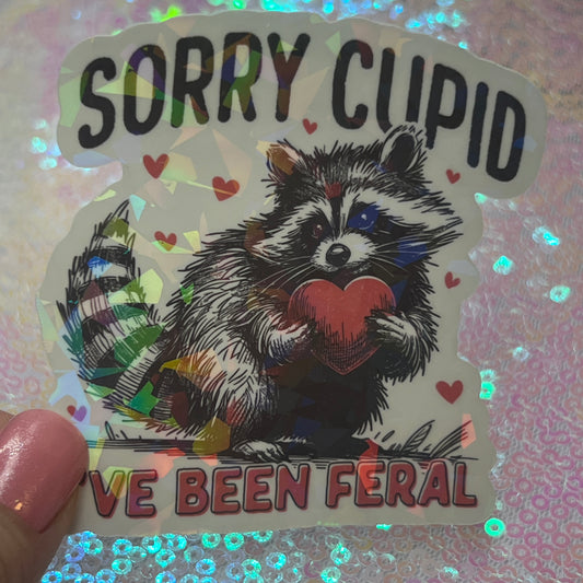 Sorry Cupid Ive Been Feral Raccoon Holographic Sticker