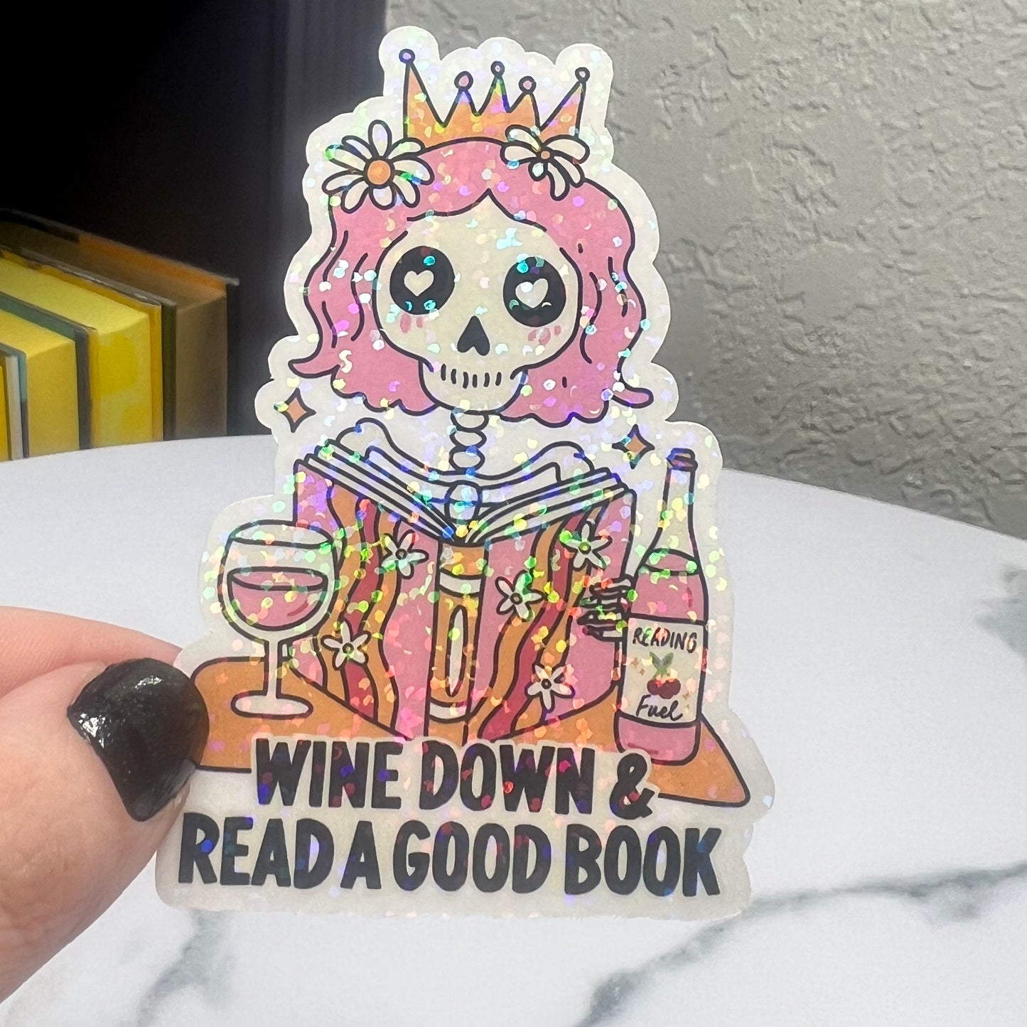 Wine Down With a Good Book Sticker - Female Skeleton Reading & Drinking Wine, Holographic Decal for Book and Wine Lovers Kindle Waterbottle