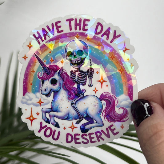 Holographic "Have the Day You Deserve" Skeleton Riding Unicorn Decal Middle Finger Rainbow Sticker | Sassy Funny Holographic Sticker