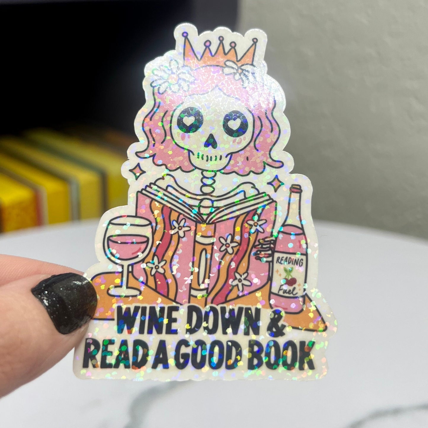 Wine Down With a Good Book Sticker - Female Skeleton Reading & Drinking Wine, Holographic Decal for Book and Wine Lovers Kindle Waterbottle